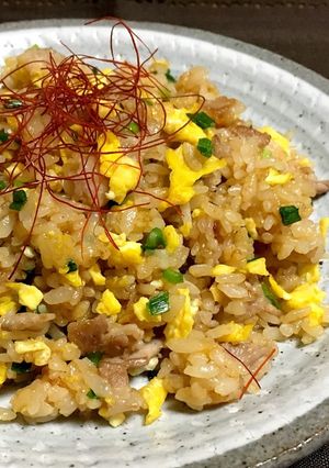 A picture of Huh? Bibimbap? Super Tasty Fried Rice with BBQ Sauce.