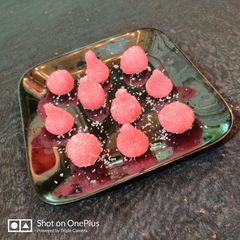 A picture of Rose coconut modaks balls.