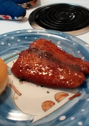A picture of fried BBQ salmon sandwich.