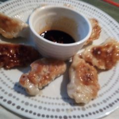 A picture of Gyozas / Dumplings / Dim Sums / Potstickers.