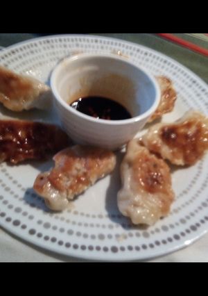 A picture of Gyozas / Dumplings / Dim Sums / Potstickers.