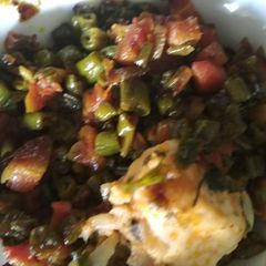 A picture of Beans carrot fry with cheese.