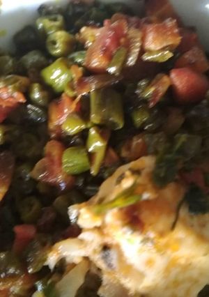 A picture of Beans carrot fry with cheese.