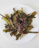 Roasted leek tops with vinaigrette