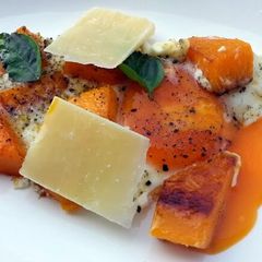 A picture of Fried Eggs And Squash Top Parmesan Cheese.