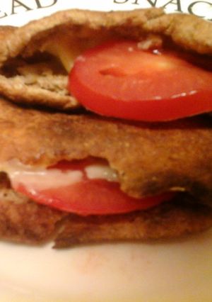 A picture of Toasted cheese & tomato naan.