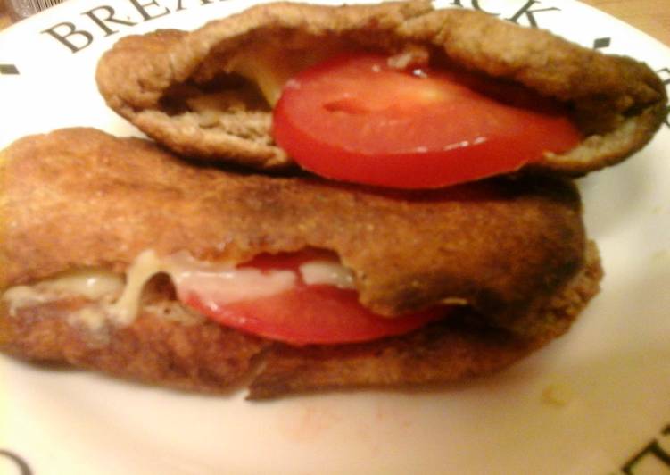 Step-by-Step Guide to Prepare Quick Toasted cheese &amp; tomato naan