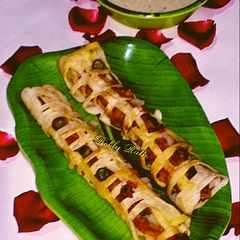 A picture of Net masala dosa roll with coconut peanut chutney.