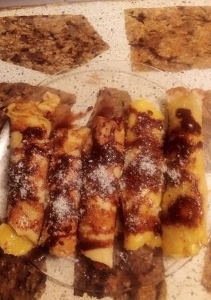 Una foto de Panqueques de pera rellenos con dulce de leche