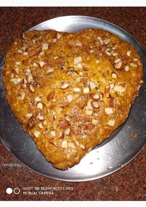 A picture of Heart shaped Orange almond cake.