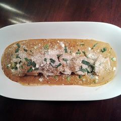 A picture of Pork Tenderloin Poached in a Pork Cream Sauce.