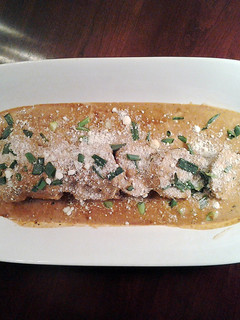 A picture of Pork Tenderloin Poached in a Pork Cream Sauce.