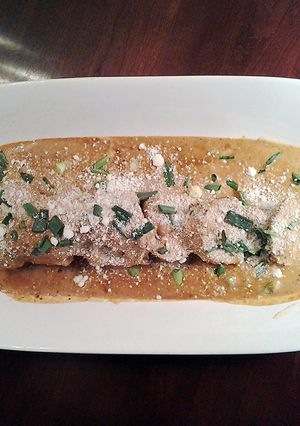 A picture of Pork Tenderloin Poached in a Pork Cream Sauce.