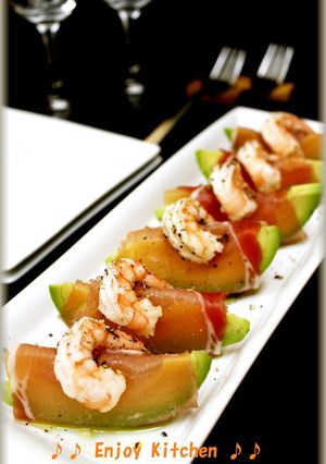 A picture of Grapefruit and Avocado Wrapped In Cured Ham.