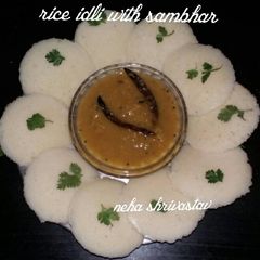 A picture of Rice idli with sambhar.