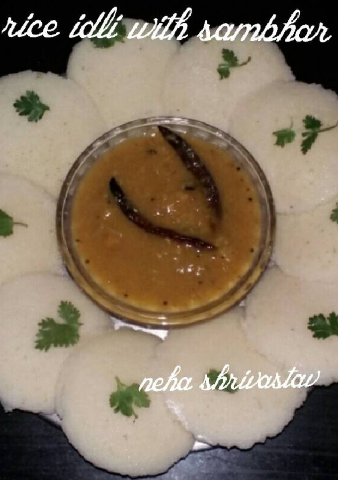 A picture of Rice idli with sambhar.