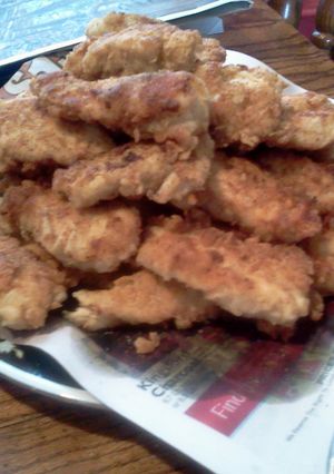 A picture of crispy chicken tenders.
