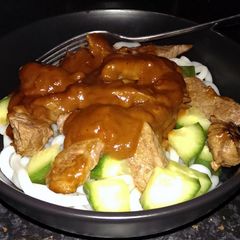 A picture of Sophie's udon noodles and satay steak.