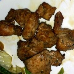 A picture of Asian-flavored chicken skewers.