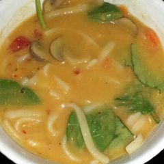 A picture of Thai coconut curry soup.