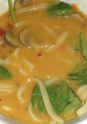 A picture of Thai coconut curry soup.