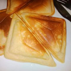 A picture of Jam filling Toasted Pancakes.