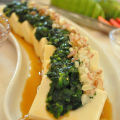 A picture of Chilled Tofu with Mulukhiyah.
