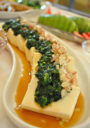 A picture of Chilled Tofu with Mulukhiyah.