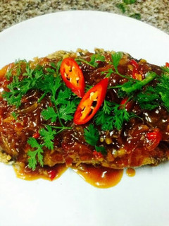 A picture of Kanya's Fried Fish with Chili and Ginger Sauce.