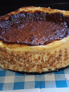 Una foto de Tarta de queso de la viña con crocanti de almendra
