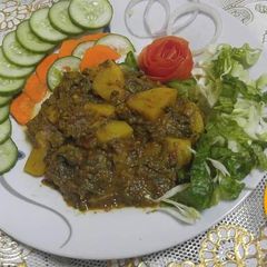 A picture of Baghair oil ke Aalu palak.