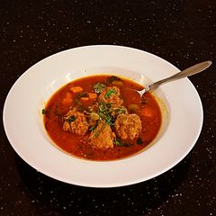 A picture of Meatballs in Tomato Vegetable Broth.