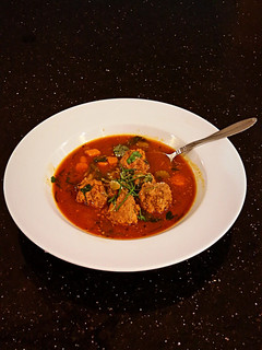 A picture of Meatballs in Tomato Vegetable Broth.