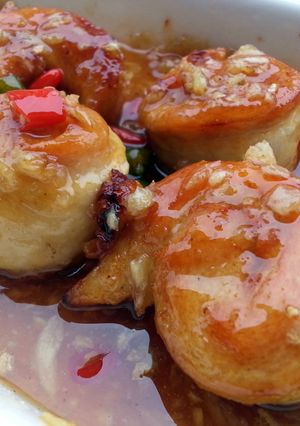 A picture of Chicken Pinwheel In Spicy Garlic Plum Sauce.