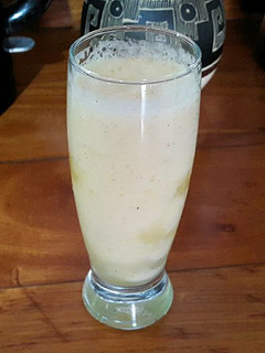 Una foto de Licuado especiado de piña y manzana roja
