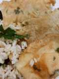 Merluza a la romana y arroz seco con olivas mallorquinas