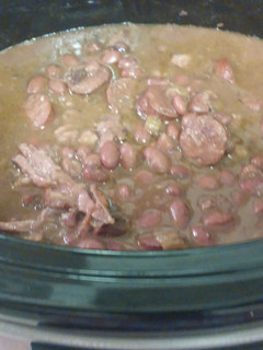 A picture of Slow CookRed beans with Andouille Sausages & Smoke Neck bones.