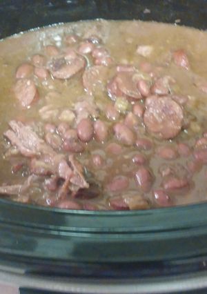 A picture of Slow CookRed beans with Andouille Sausages & Smoke Neck bones.