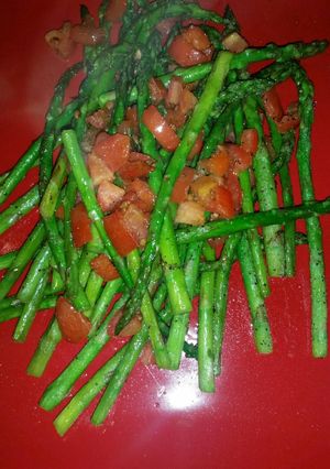 A picture of Asparagus with Roma tomatoes.