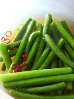 A picture of Garlic Shoots Asazuke, Lightly Pickled Vegetables.