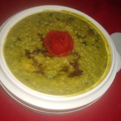 A picture of Yellow moong dal,poha and spinach khichdi.