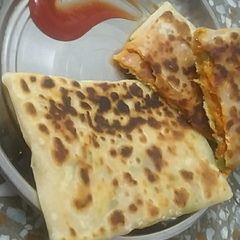 A picture of Veg.cheese burst paratha.