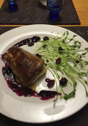 A picture of Foie Gras With Blueberry Sauce.