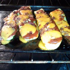 A picture of Zucchini. & squash pizzas.