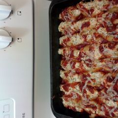 A picture of Shrimp stuffed shells with 4 cheese..