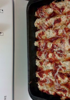 A picture of Shrimp stuffed shells with 4 cheese..