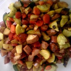 A picture of Roasted kielbasa and vegetables.