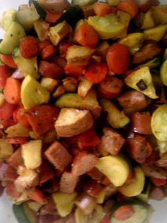 A picture of Roasted kielbasa and vegetables.