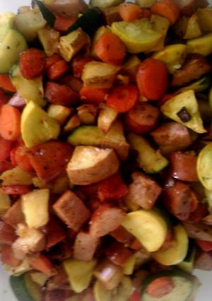 A picture of Roasted kielbasa and vegetables.