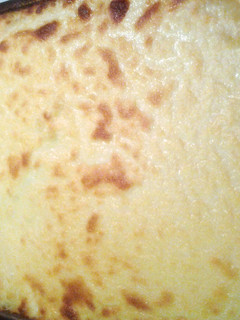 A picture of baked mashed potatoes.